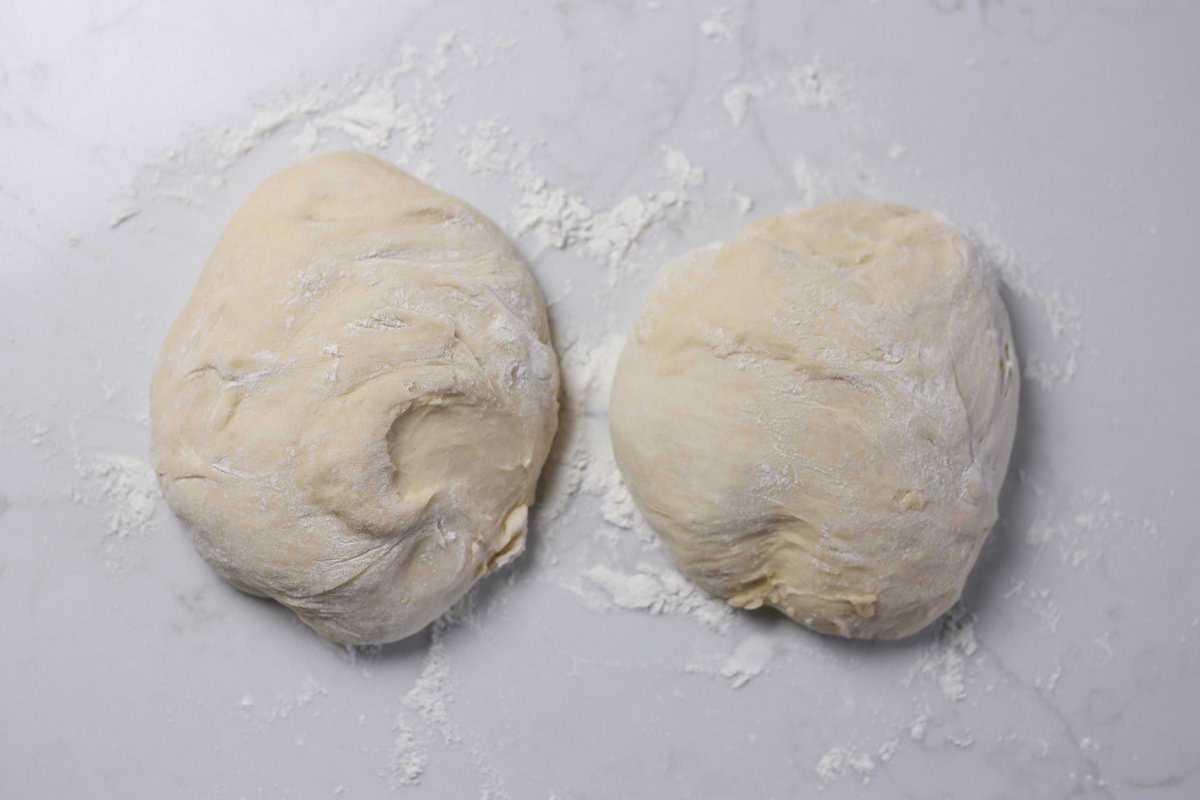 Two dough mounds side by side. 