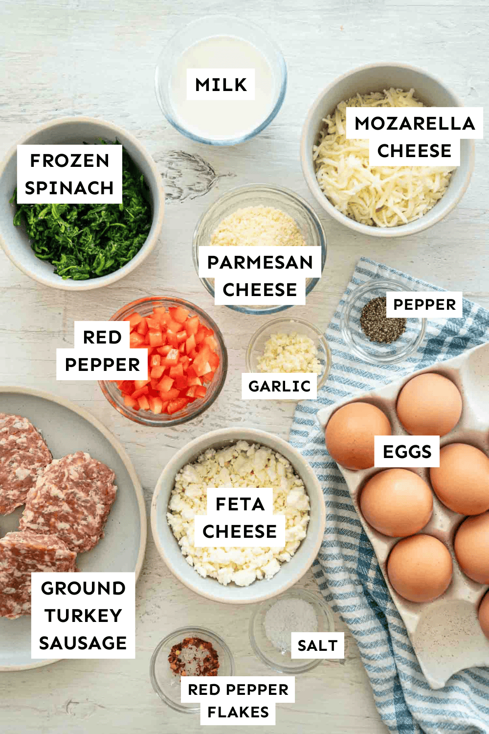 Ingredients for Mediterranean high protein breakfast casserole measured out and labeled.