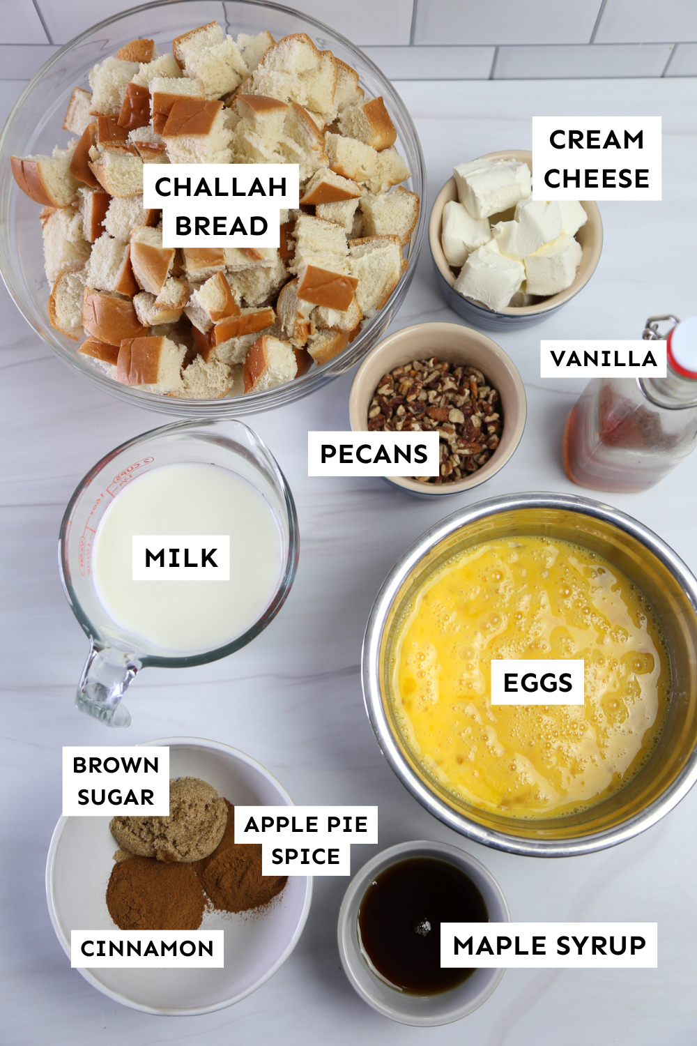 Apple cinnamon french toast casserole ingredients measured out and labeled.