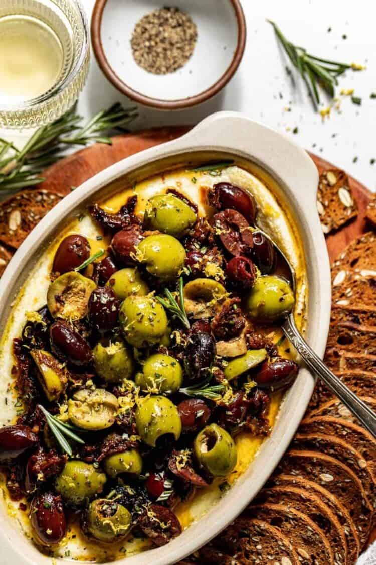 Creamy whipped feta dip topped with roasted olives.