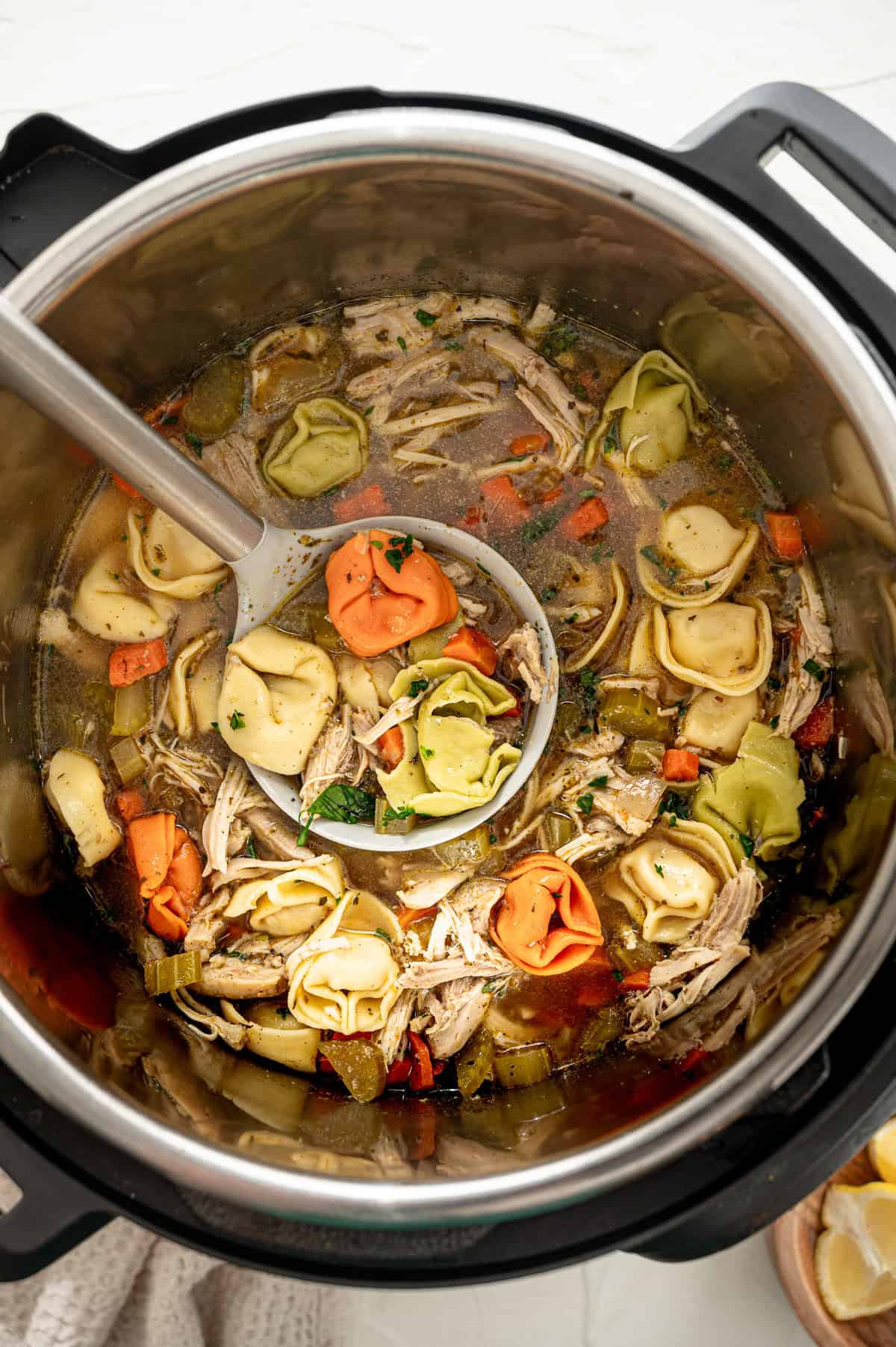 Chicken tortellini soup on the Instant Pot ready to serve.