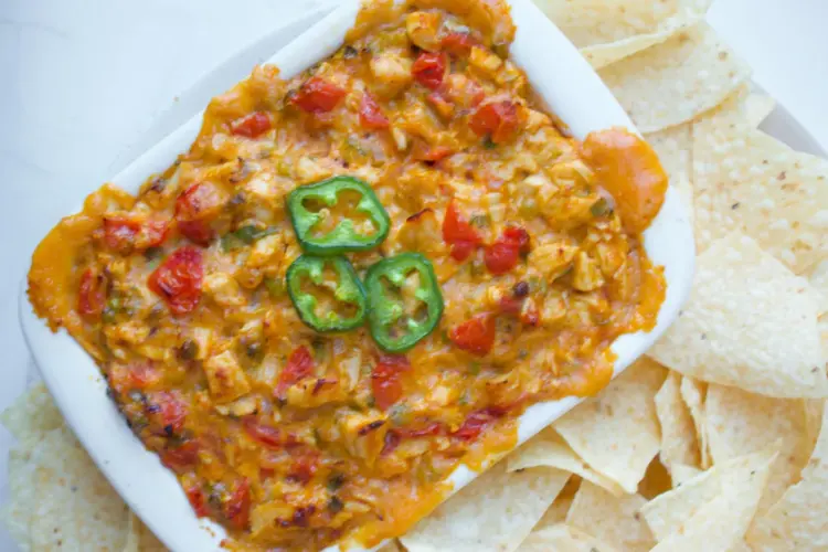 Jalepeno chicken dip in a white baking dish.