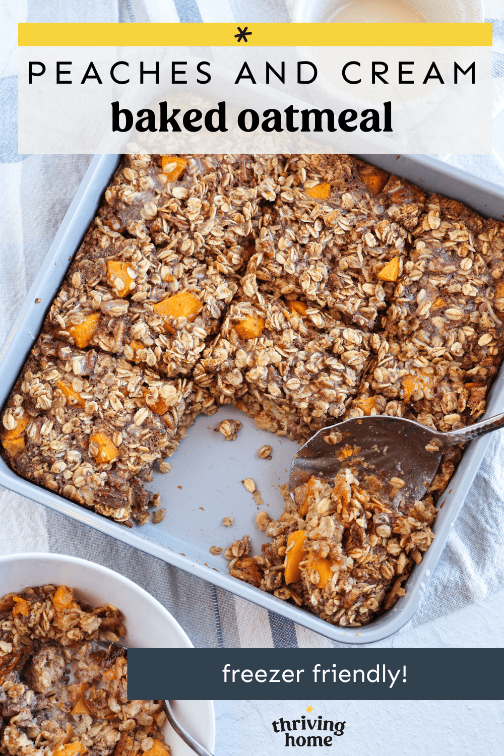 Peaches and cream baked oatmeal in a baking dish with a serving missing.