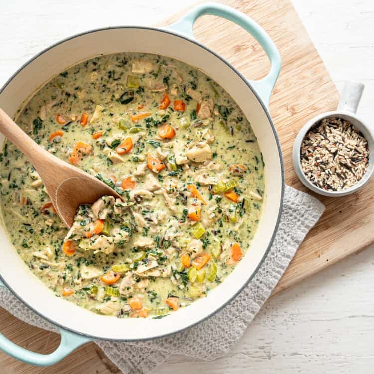 Boursin chicken and wild rice soup in a dutch oven ready to serve.