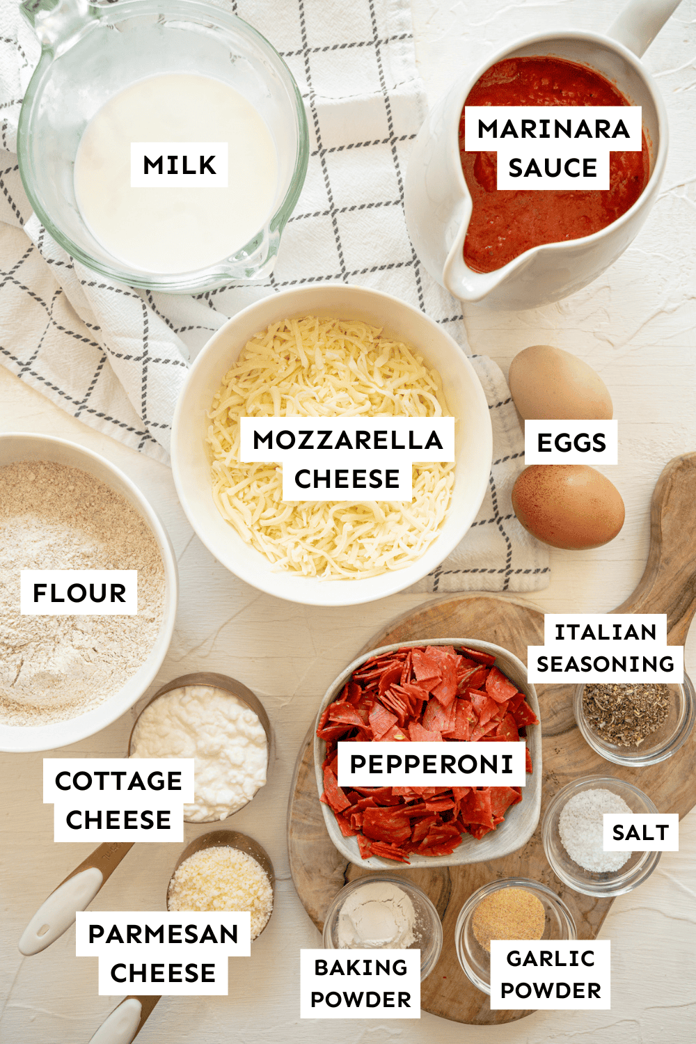 High protein pepperoni pizza muffin ingredients measured out and labeled.