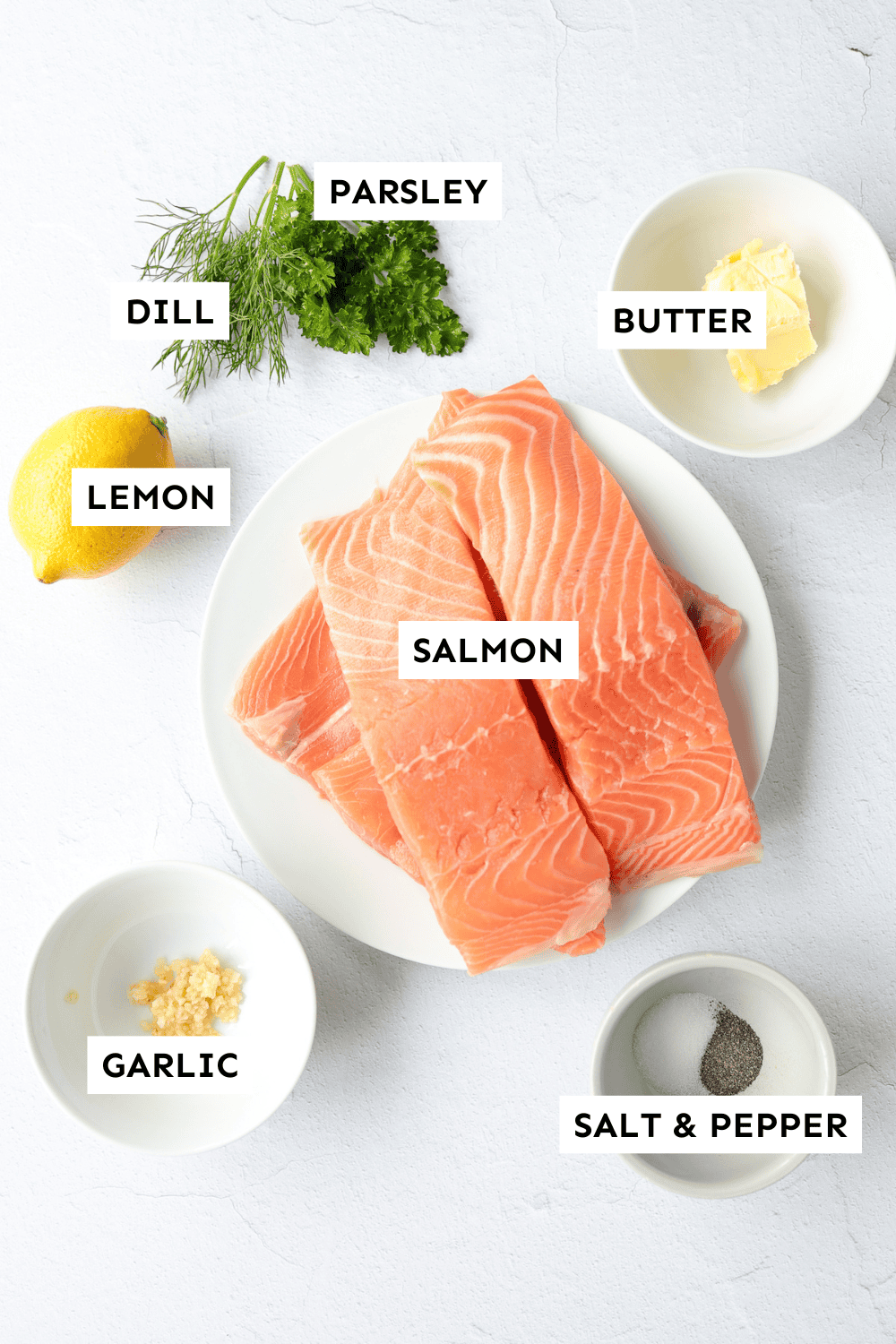 Lemon garlic salmon ingredients measured out and labeled.