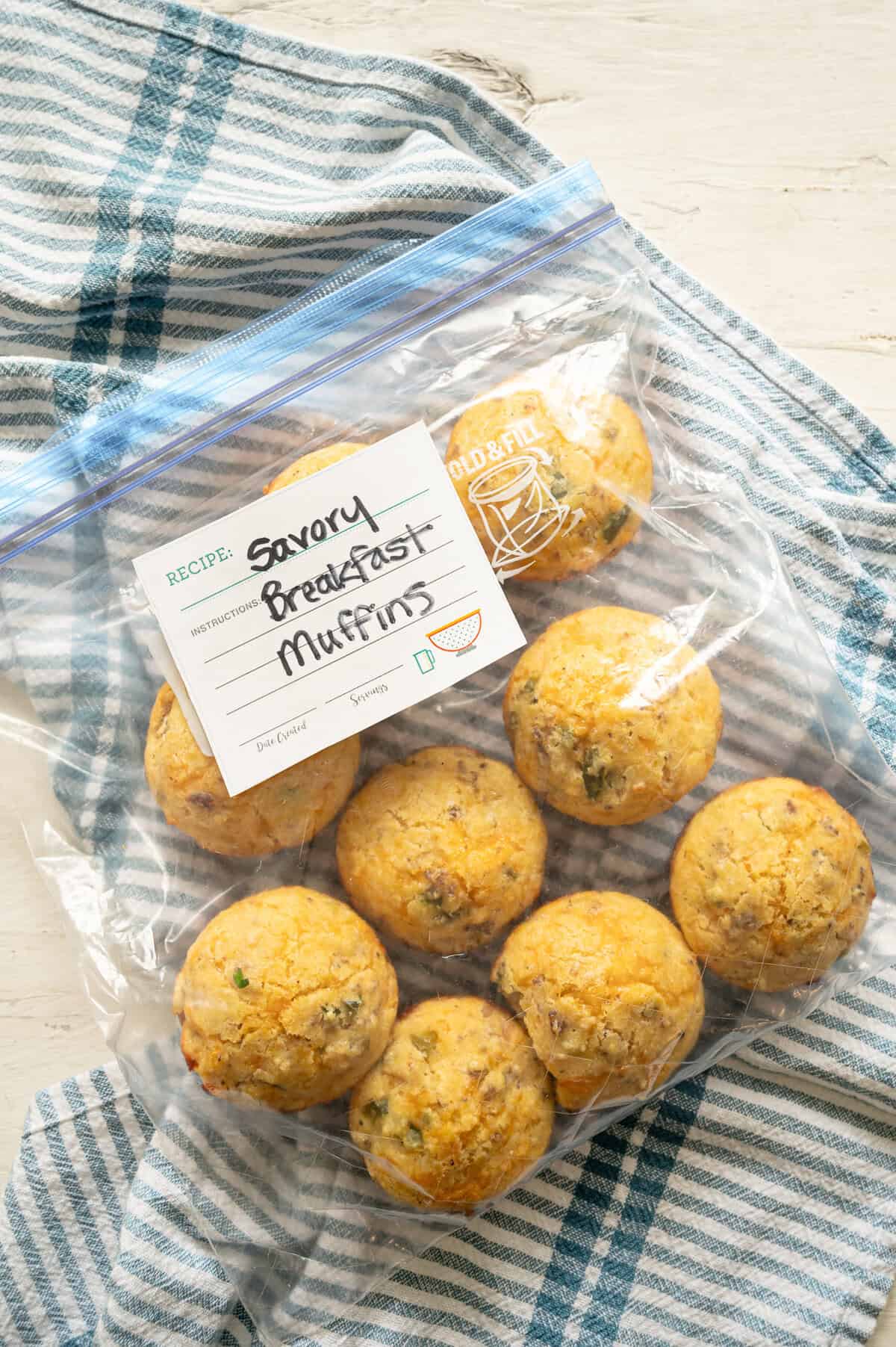Cornmeal muffins in a freezer bag labeled Savory Breakfast Muffins.