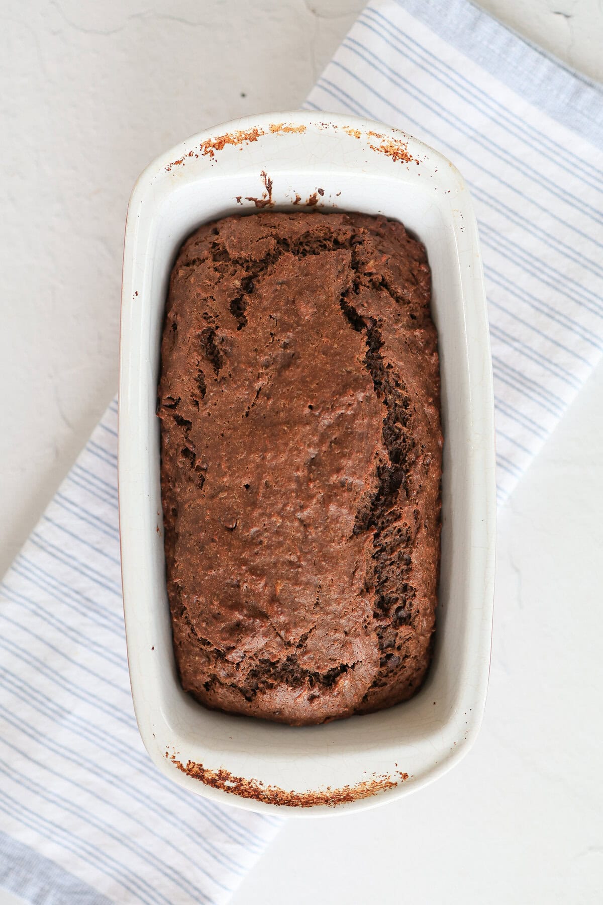 Chocolate sweet potato bread straight from the oven in the loaf pan.