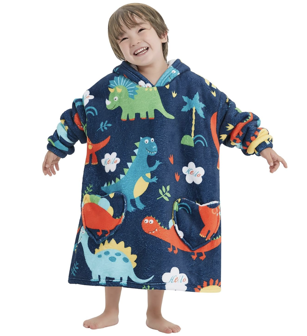 A young boy in a wearable blanket.
