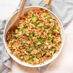 Egg fried rice in a ceramic skillet.