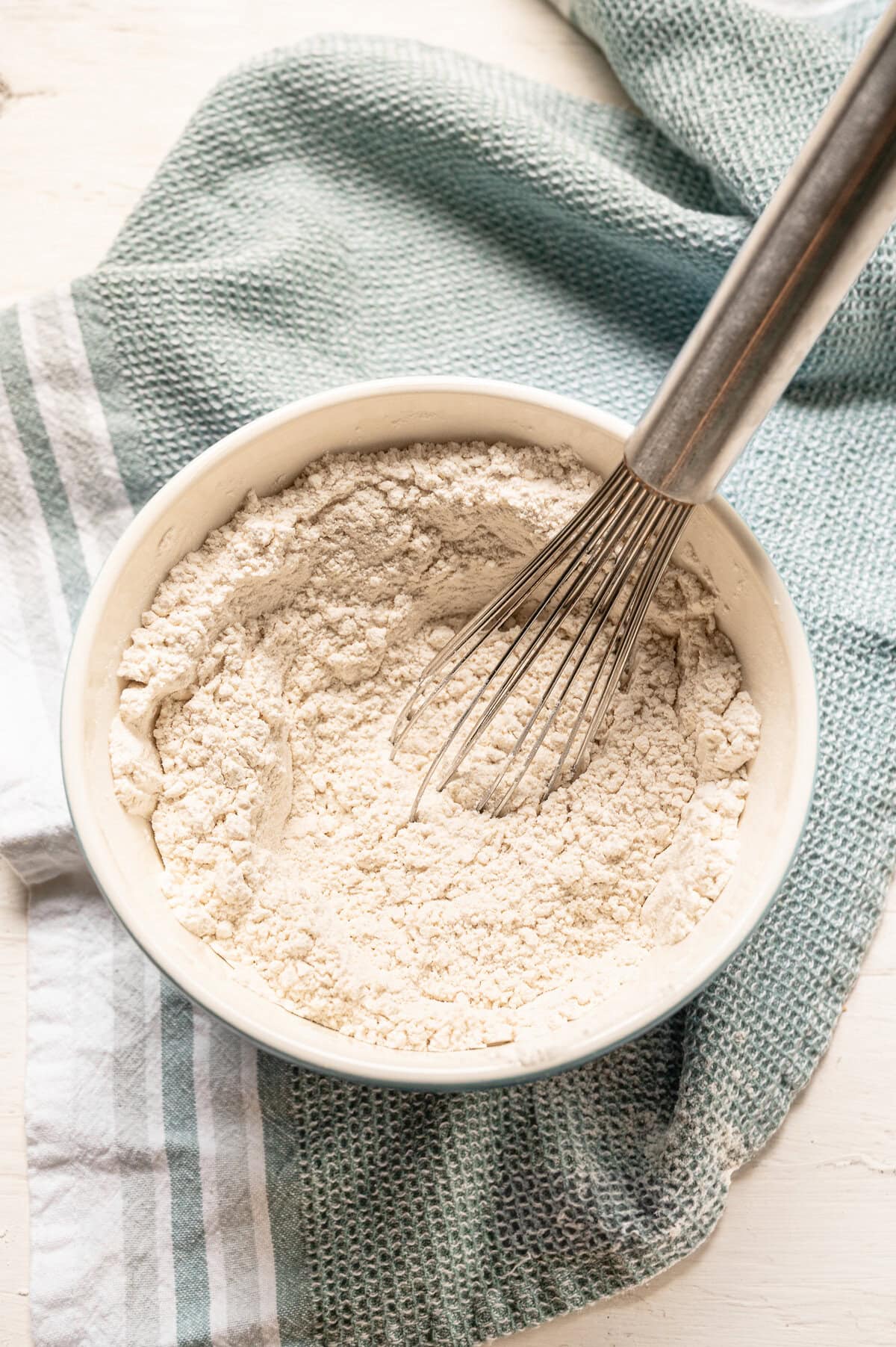 Dry ingredients for cookies being whisked together.