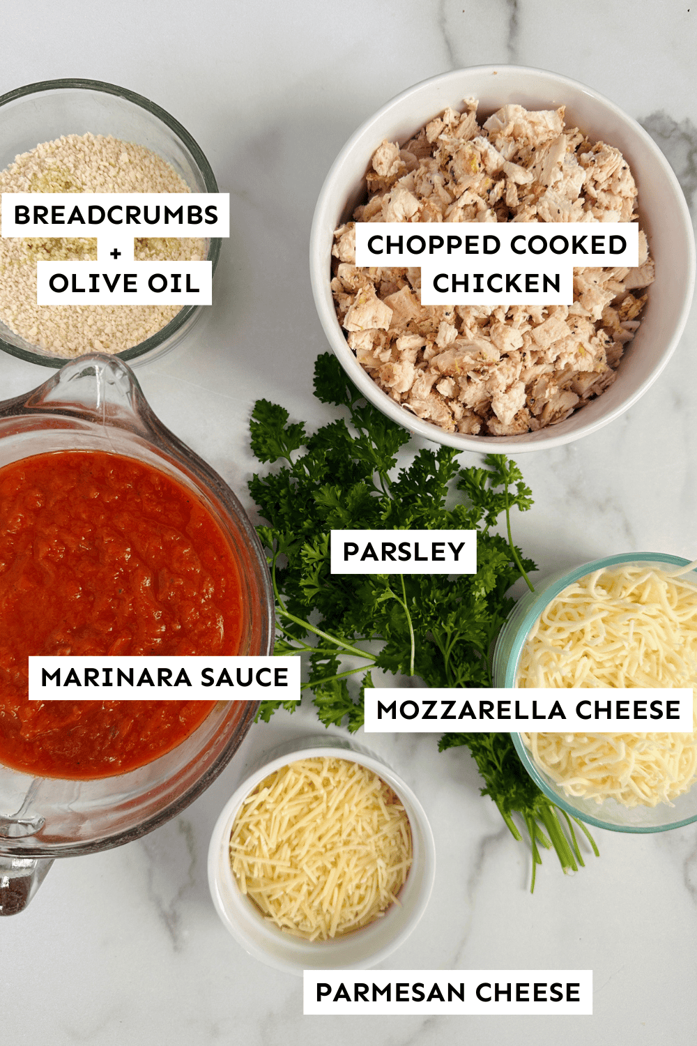 ingredients laid out for chicken parmesan casserole.
