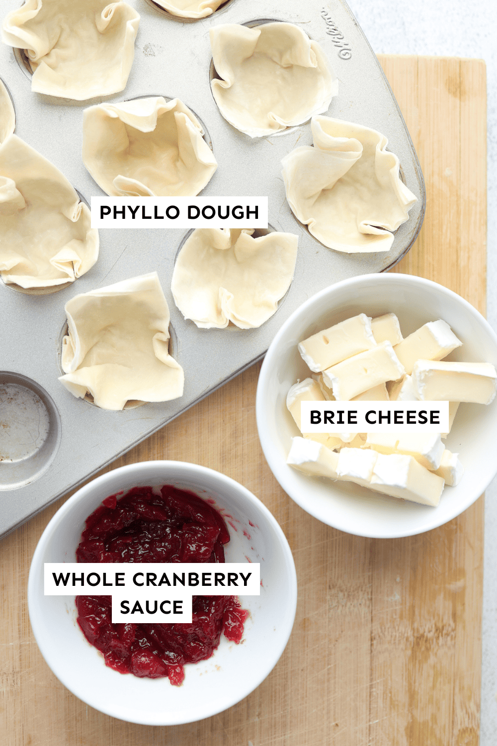 Ingredients for cranberry brie mini phyllo cups measured out and labeled.