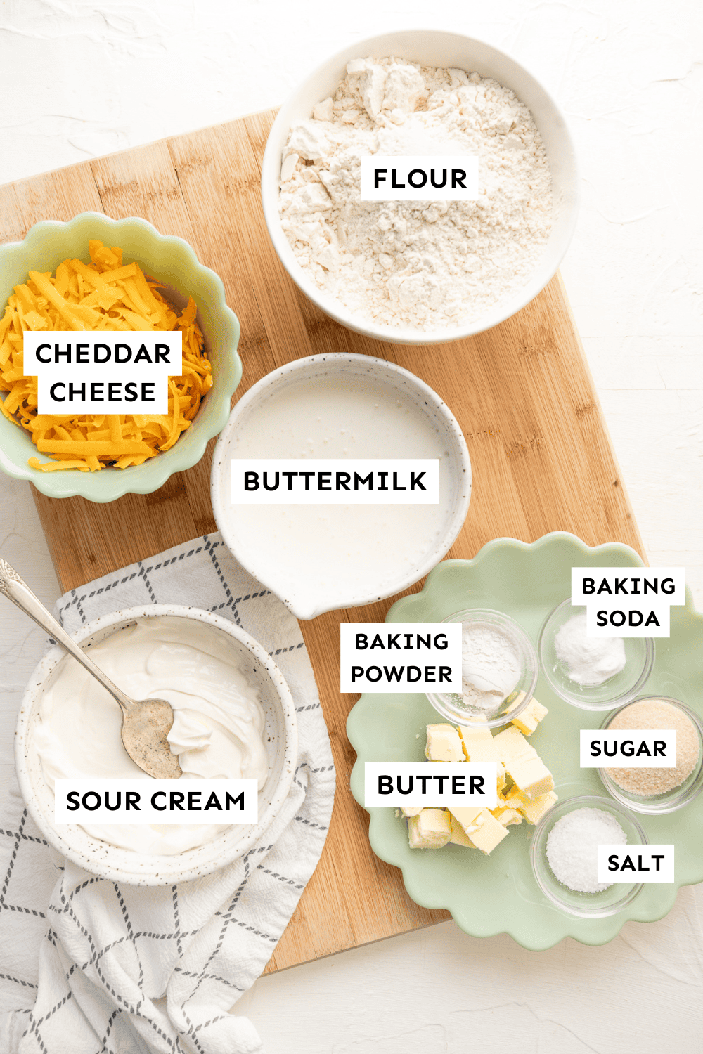 Ingredients for cheddar bay biscuits measured out and labeled.