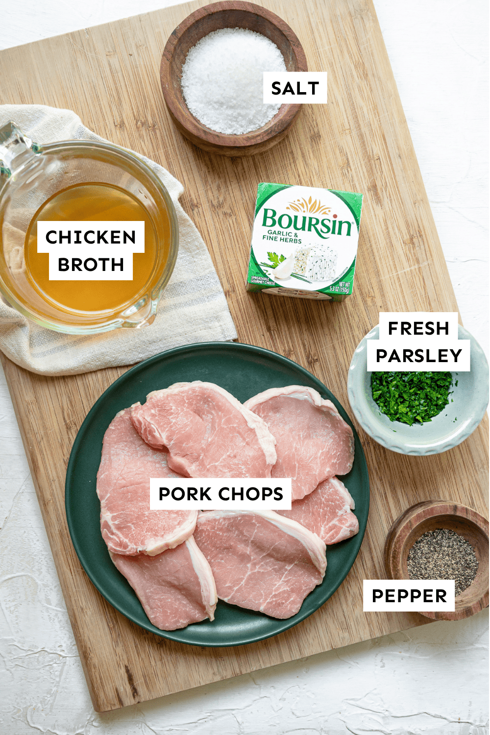 Ingredients for Boursin pork chops measured out and labeled.